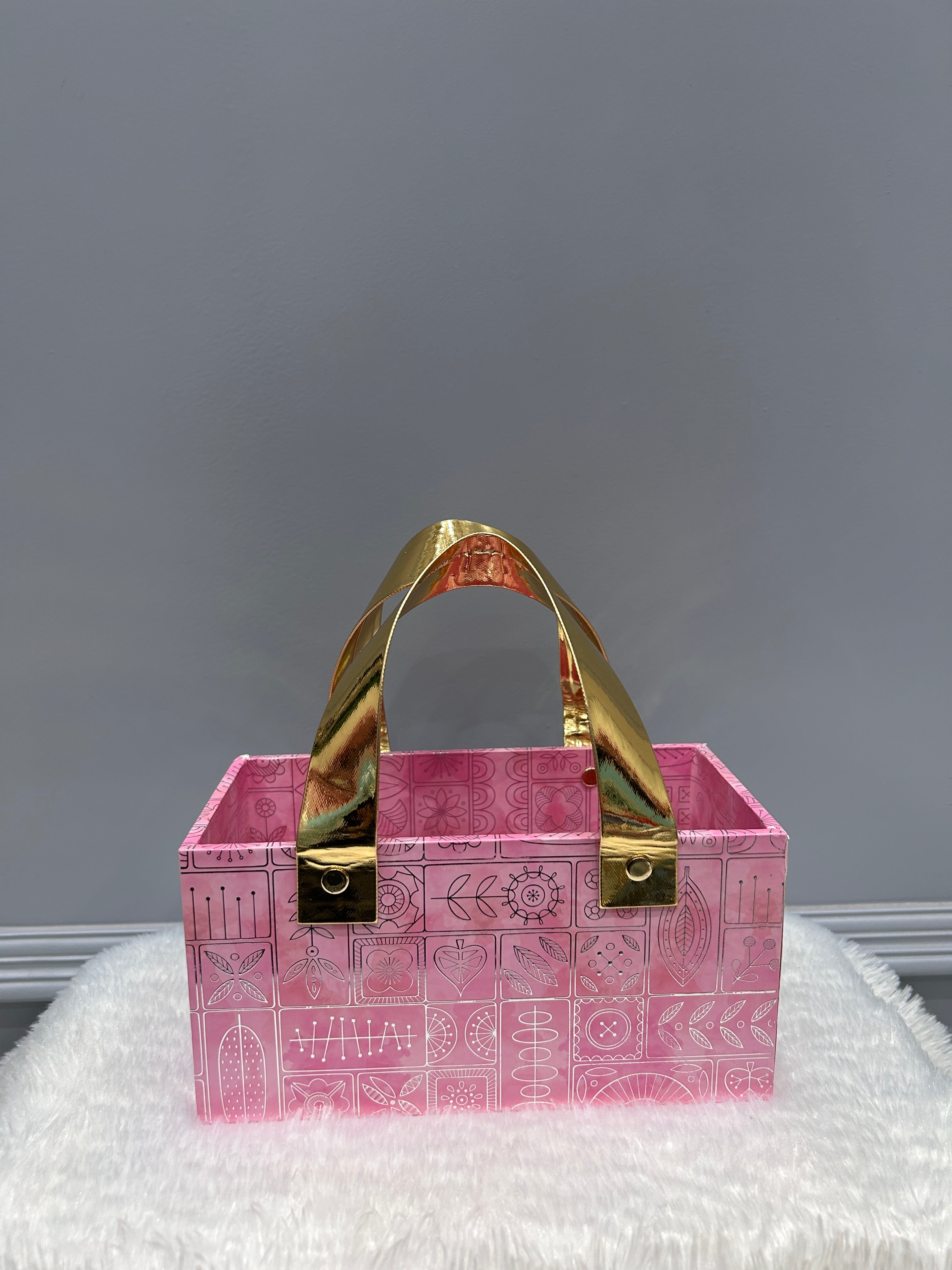 Pink Box With Golden Grip