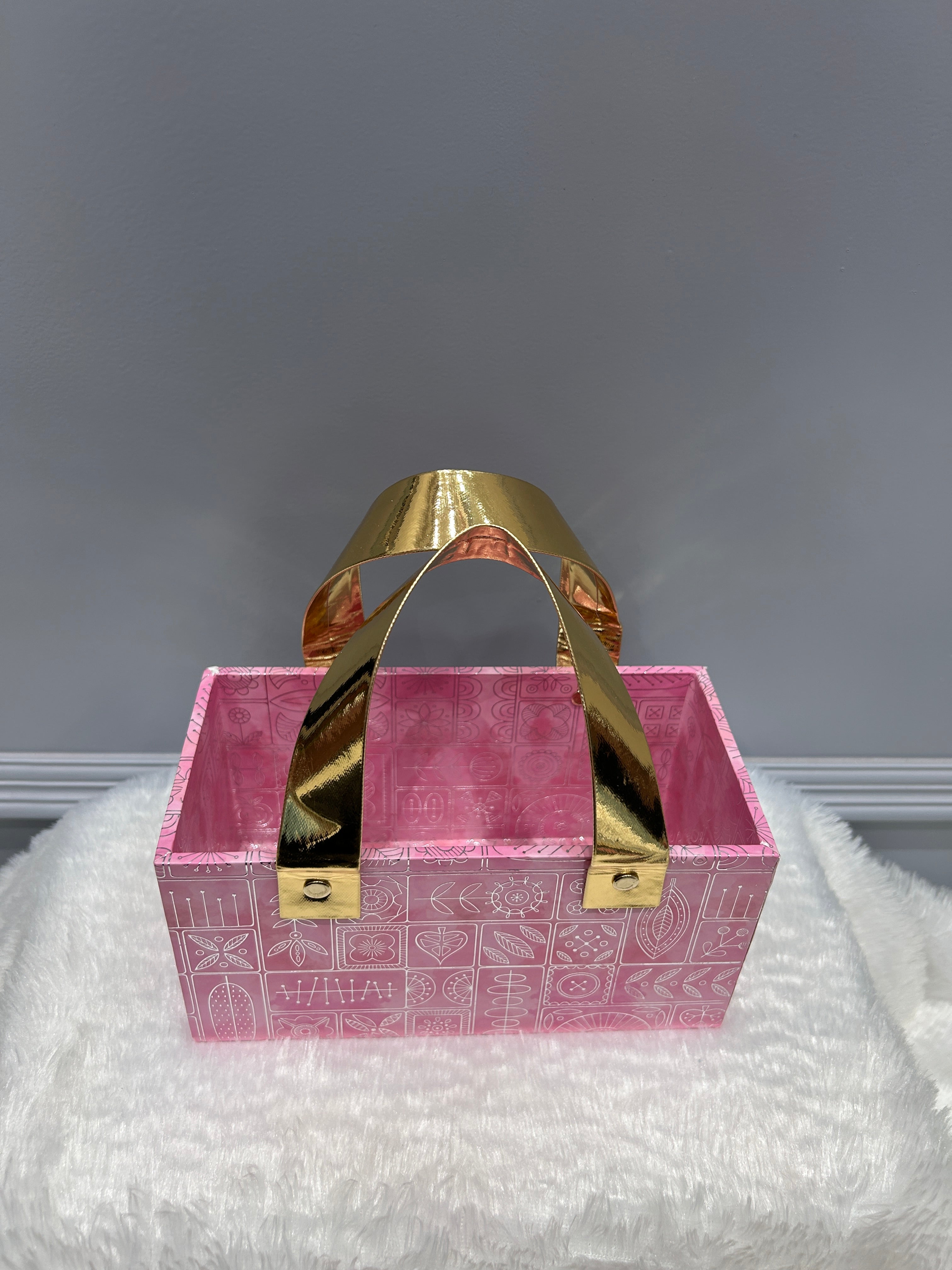 Pink Box With Golden Grip